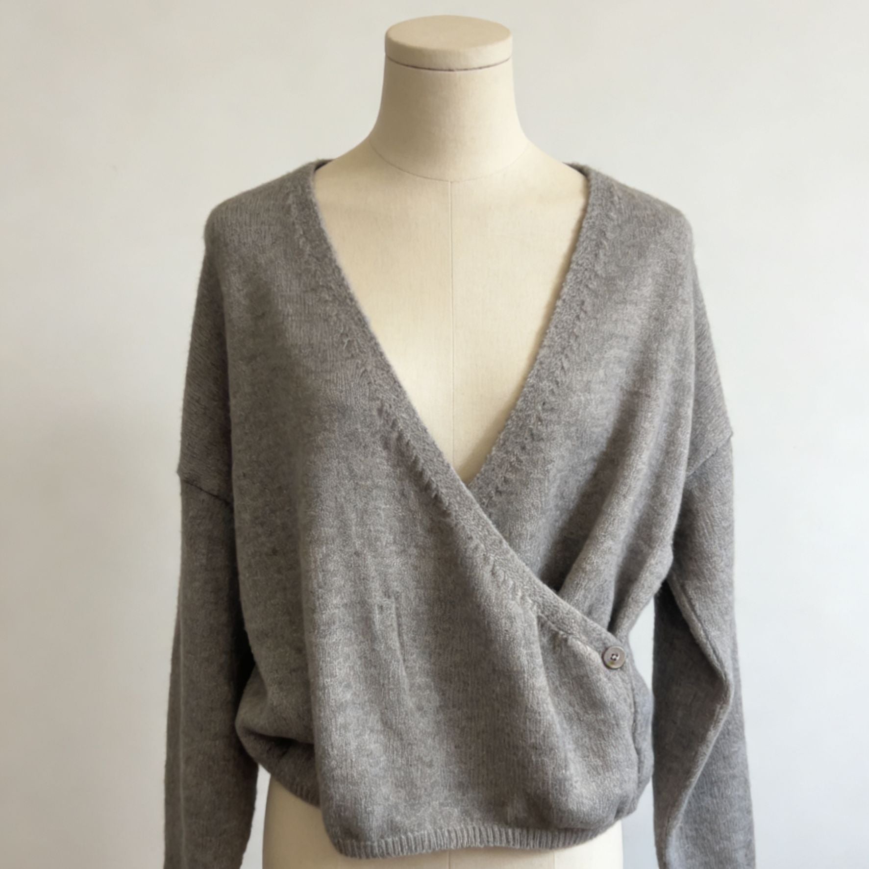 V-neck crossover striped knitted sweater