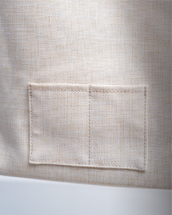 Back pocket stitching detail on the Light of Dawn Sake Bag in Linen at Grandmama Store in Hong Kong.