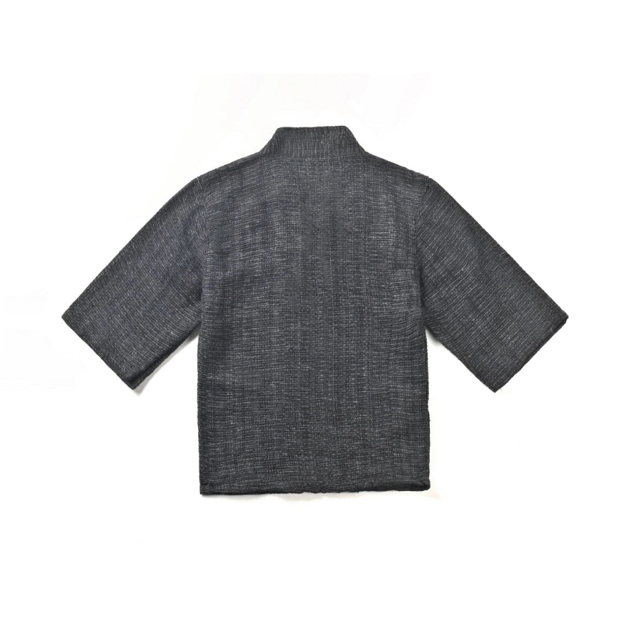 Back view flat-lay of solid charcoal grey Hand-cranked Kimono at Grandmama Store in Hong Kong.