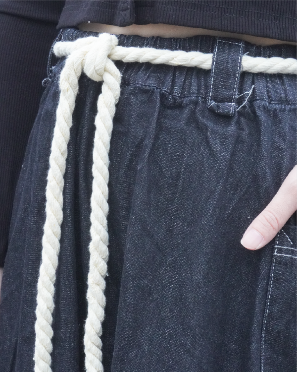 Close-up detail of the black Kamon Denim Dress waistband, belt loops, and rope belt at Grandmama Store in Hong Kong.