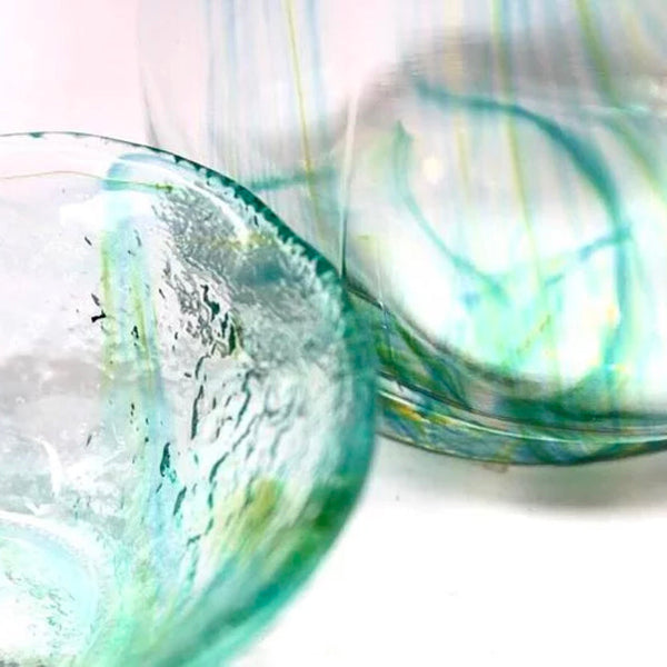 Close-up of green swirled glass Spiral Pattern Sake One Cup at Grandmama Store in Hong Kong