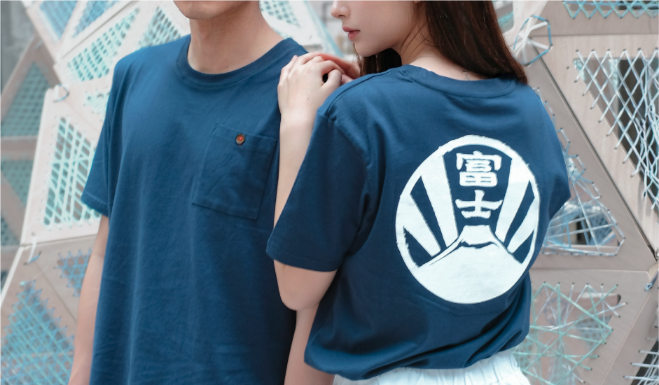 Couple wearing navy Mt Fuji Kamon Tee at Grandmama Store in Hong Kong