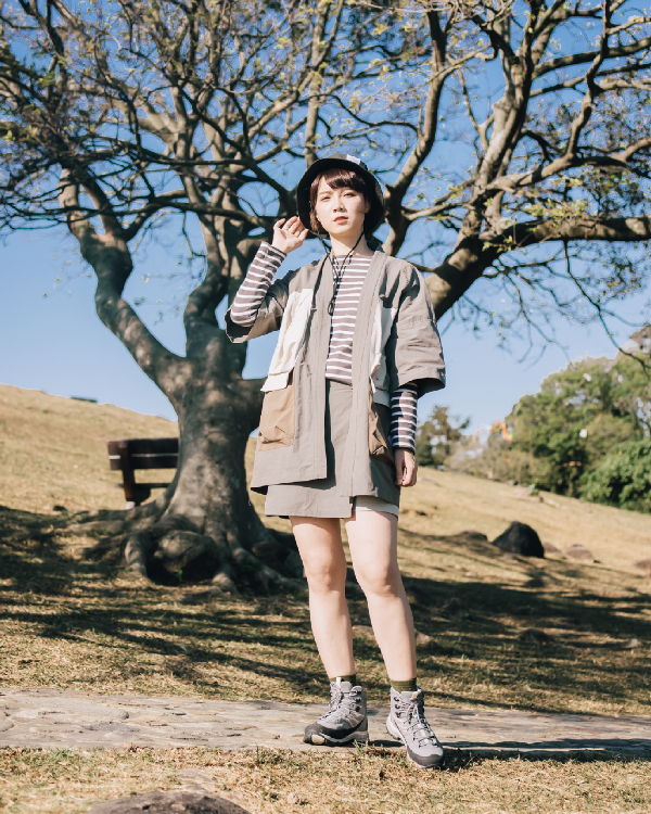 Female model wearing greyish Morikawa Yama Kimono Jacket under a tree at Grandmama Store in Hong Kong.