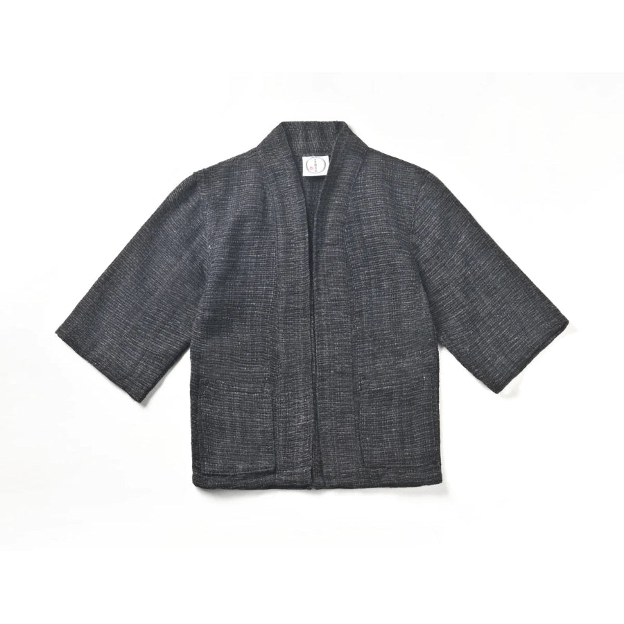 Flat-lay front view of solid charcoal grey Hand-cranked Kimono at Grandmama Store in Hong Kong.