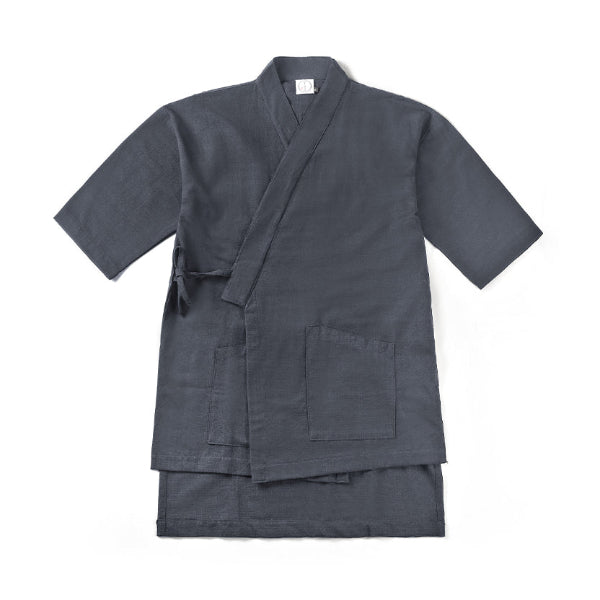 Front view flat lay of black Japanese wrap-style Kamon Kimono Jacket at Grandmama Store in Hong Kong.