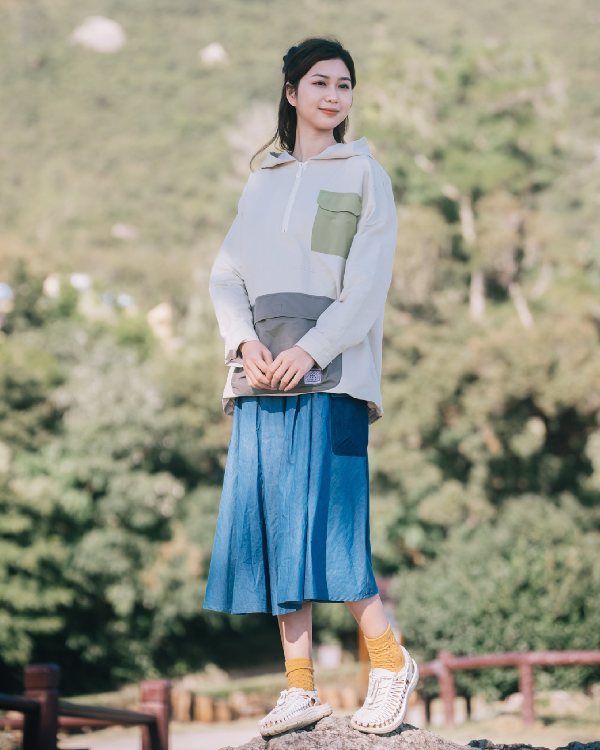 Full-body lookbook shot of the light blue Yama Ocean Pocket Dress outdoors at Grandmama Store in Hong Kong.