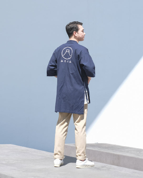 Full body back view of male model in navy blue Fuji San Kamon Kimono Jacket at Grandmama Store in Hong Kong.