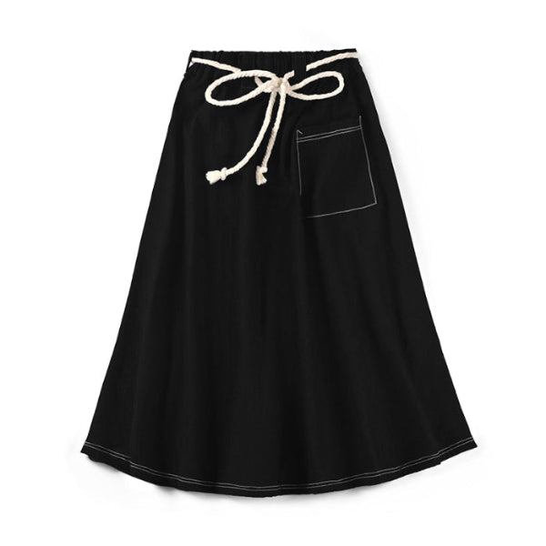 Full view flat lay of black Kamon Denim Dress-Lion Rock featuring a bow-tied rope belt at Grandmama Store in Hong Kong.