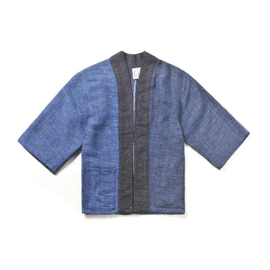 A flat lay image of a hand-cranked Hand-cranked Kimono in dark navy blue flat-lay view at Grandmama Store in Hong Kong.