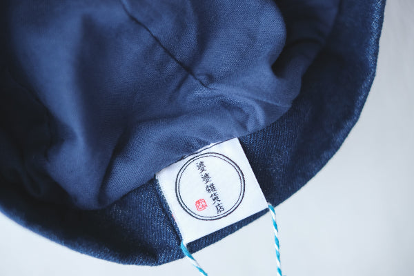 Inside view of Sunshine Beret showing inner lining and brand tag at Grandmama Store in Hong Kong.