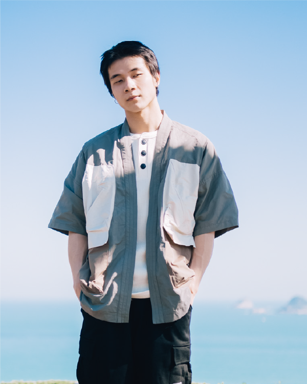 Male model in greyish Morikawa Yama Kimono Jacket at Grandmama Store in Hong Kong.