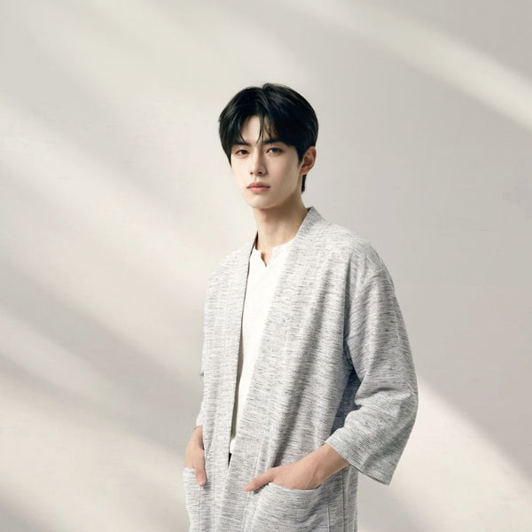 Male model wearing light grey Hand-cranked Kimono cardigan at Grandmama Store in Hong Kong.