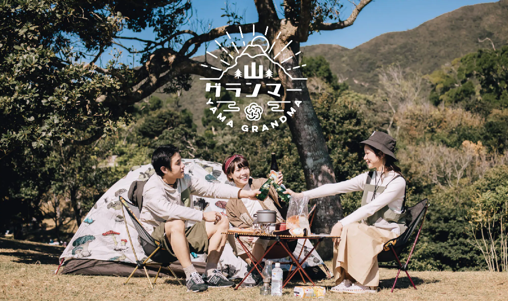Outdoor camping scene featuring a woman wearing the black Yama Multifunctional Bag at Grandmama Store in Hong Kong.