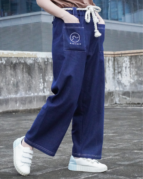 Outdoor full-length view of navy blue Kamon Japanese Waist Rope Pants at Grandmama Store in Hong Kong.