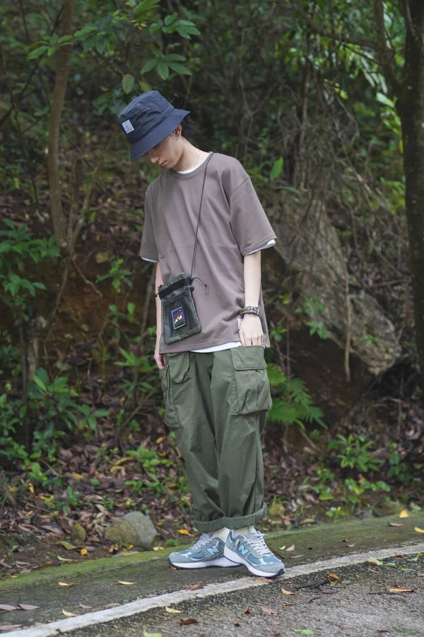 Outdoor outfit featuring a taupe brown Yama Basic Color Tee with cargo pants at Grandmama Store in Hong Kong.