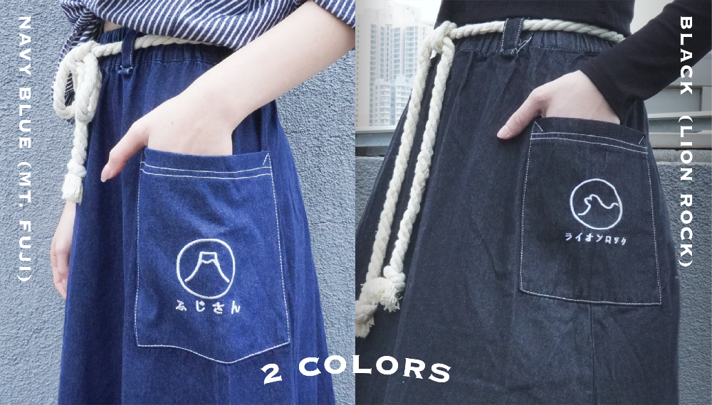 Side-by-side view showing the Navy Blue (Mt. Fuji) and Black (Lion Rock) options of the Kamon Denim Dress with embroidered pocket details at Grandmama Store in Hong Kong.