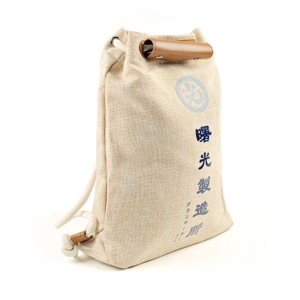 Side view of the Light of Dawn Sake Bag in linen at Grandmama Store in Hong Kong.