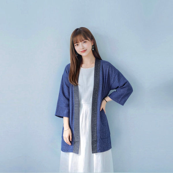 Standing model wearing dark blue Hand-cranked Kimono at Grandmama Store in Hong Kong.