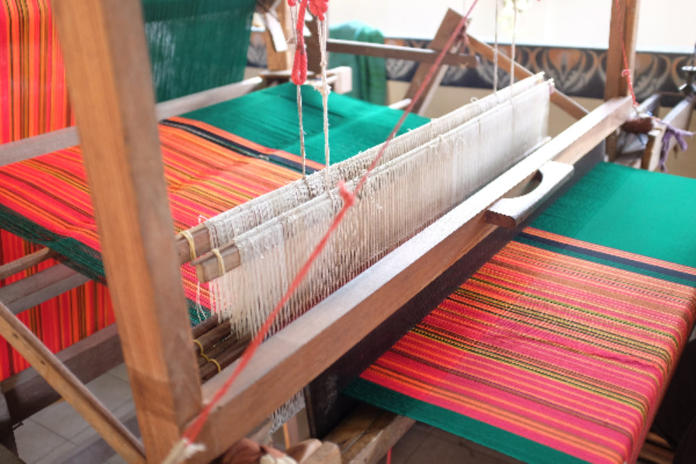 Traditional wooden hand loom weaving colourful textiles for the Hand-cranked Kimono collection at Grandmama Store in Hong Kong.
