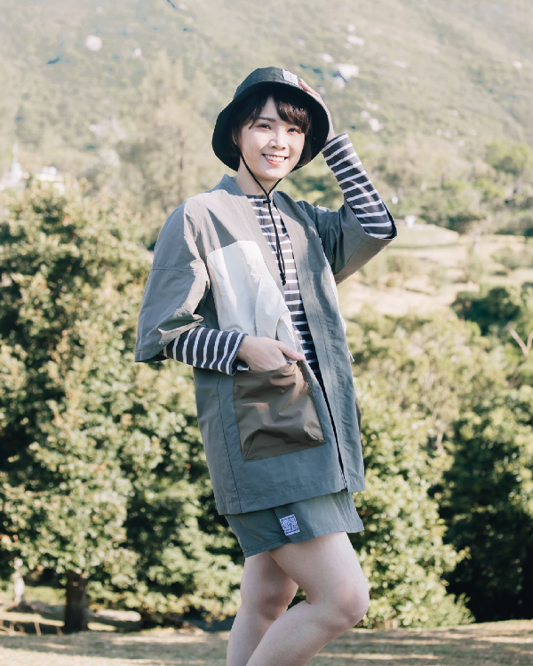 Woman wearing the greyish Morikawa Yama Kimono Jacket at Grandmama Store in Hong Kong.