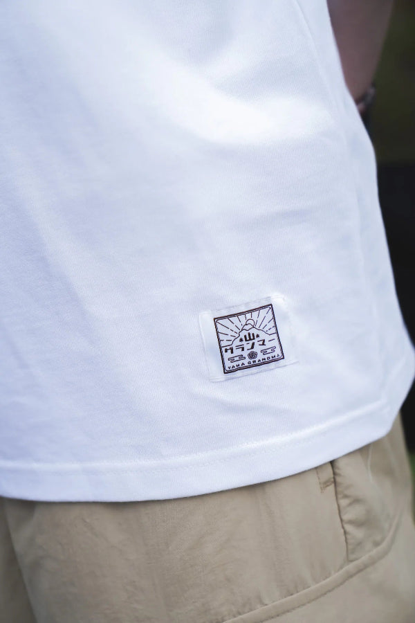 Woven logo tag close-up on white Yama Basic Color Tee at Grandmama Store in Hong Kong.