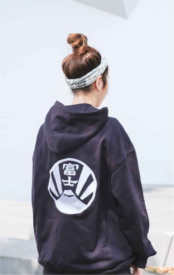 woman-with-headband-wearing-black-kamon-hoodie-back-view-Kamon-Hoodie-Hong-Kong-Kwun-Tong-Grandmama-store
