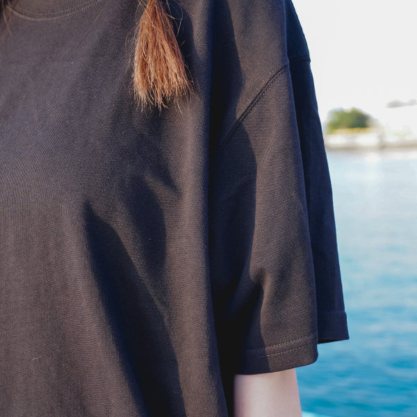 Black Yama Basic Color Tee sleeve and shoulder fit at Grandmama Store in Hong Kong.