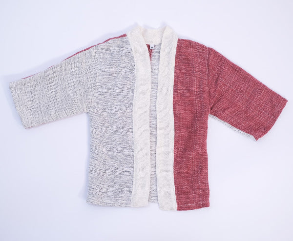 Front flat lay view of the Hand-cranked Kids Kimono jacket in Tokyo Tower red at Grandmama Store in Hong Kong.