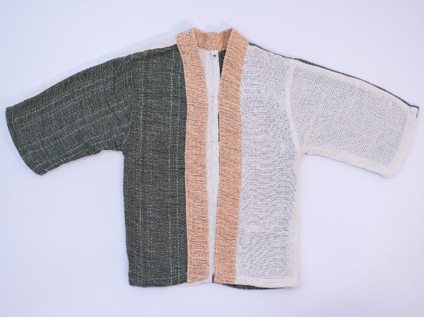 Front flat lay view of the Hand-cranked Kids Kimono jacket in Yakushima green at Grandmama Store in Hong Kong.