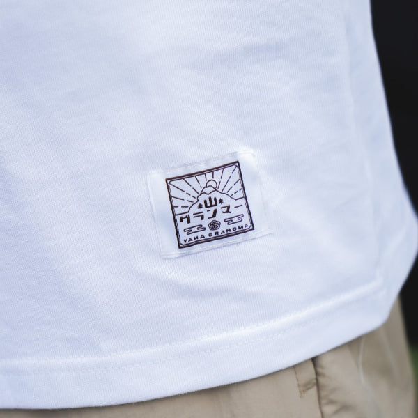 Woven brand logo patch on white Yama Basic Color Tee at Grandmama Store in Hong Kong.